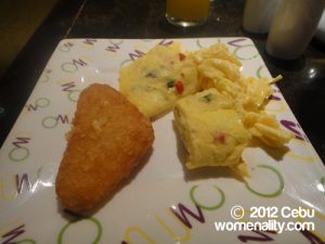 Waterfront buffet breakfast -- omelet and hash brown